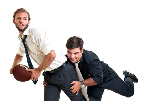 Businessman playing rugby isolated in white