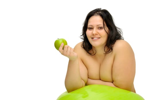 Beautiful nude large girl with an apple isolated in white