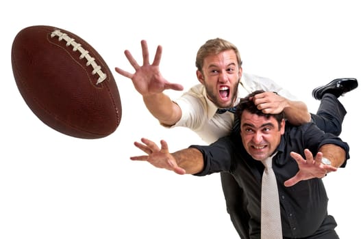 Businessmen playing rugby isolated in white