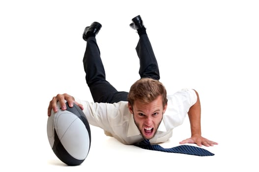 Businessman playing rugby isolated in white