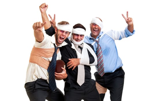 Group of injured businessmen after a rugby game