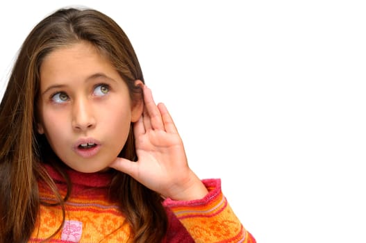 Beautiful young girl listening isolated against a white background