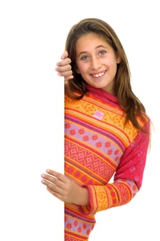 Beautiful young girl posing behind a white card isolated against a white background