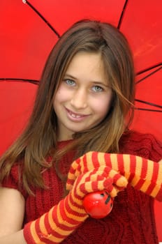 Beautiful girl with umbrella isolated in white