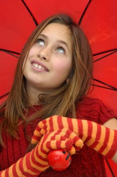 Beautiful girl with umbrella isolated in white