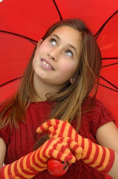 Beautiful girl with umbrella isolated in white
