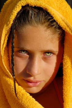 Beautiful girl posing with towel