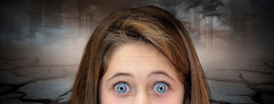 Young girl with planet eyes full of pollution fear