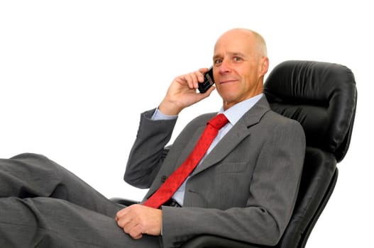 Mature man with cellphone isolated in white