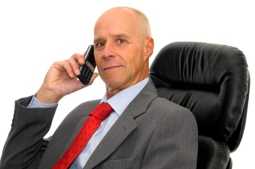 Mature man with cellphone isolated in white