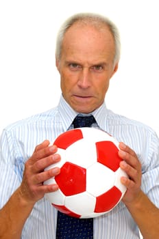 Businessman with a soccer ball isolated in white