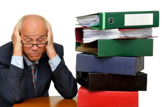 Mature businessman with stack of files isolated in white