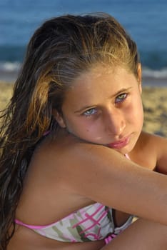Young girl posing in the beach