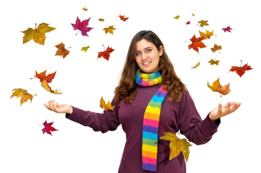 Beautiful teen with Autumn leaves falling all around isolated in white