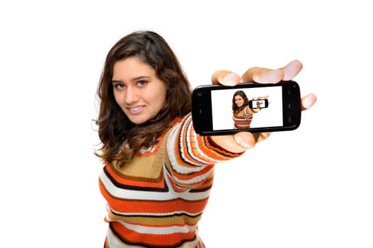 Beautiful teen with cellphone isolated in white