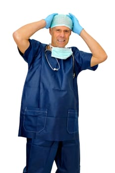 Doctor in uniform with hands in his head isolated in white