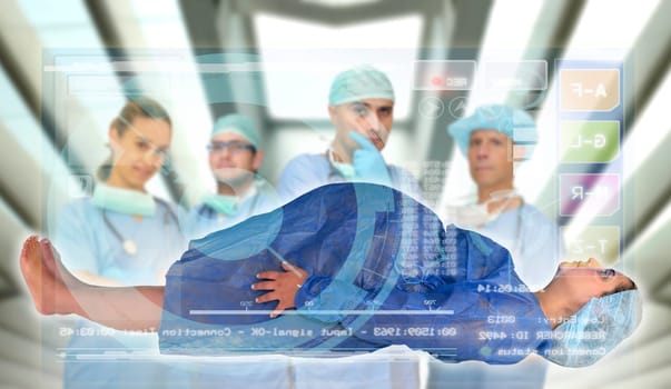 Doctors team with pregnant pacient in medical facilities with modern screen