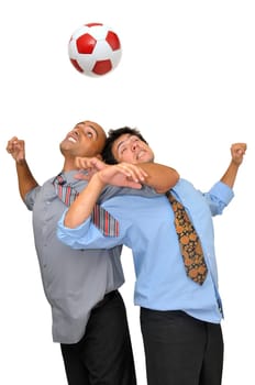 Two businessmen fighting for a ball header in a soccer game isolated in white