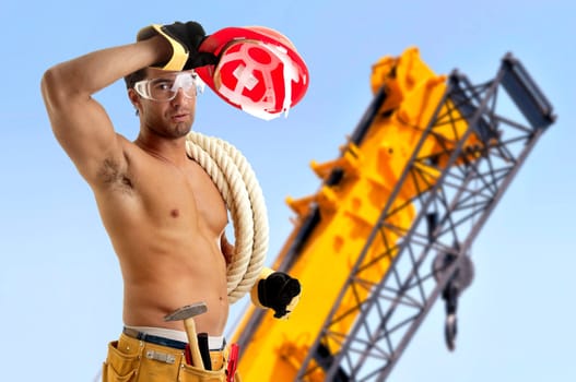Strong build construction worker in a construction site