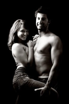 Beautiful fashionable young couple dressed in jeans