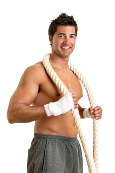 Muscular boxer posing with rope