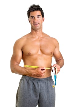 Muscular young man with measuring tape