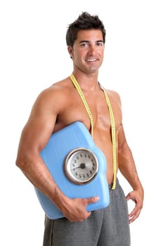 Muscular young man with weight scale