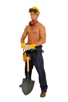 Muscular construction worker with shovel posing isolated in white
