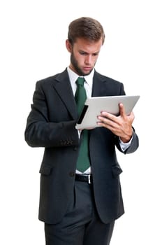 Young businessman with tablet isolated in white