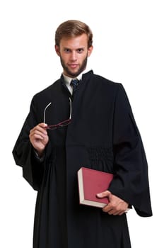 Young lawyer dressed with a toga isolated in white