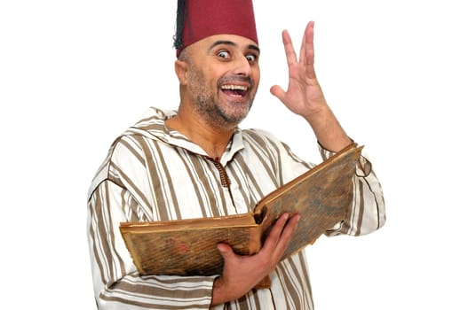 Arabic man with very old book isolated in white