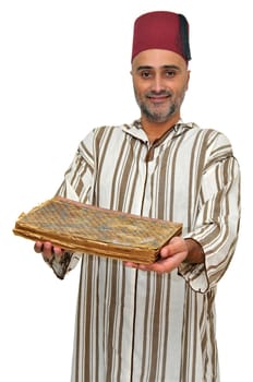 Arabic man with very old book isolated in white