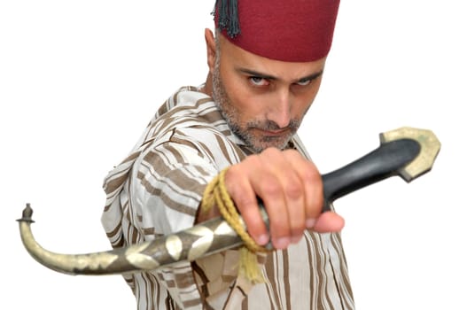 Arabic man with a dagger isolated in white