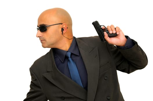Man with gun isolated against a white background
