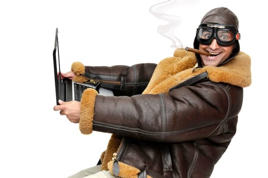 Fighter pilot with laptop isolated in white