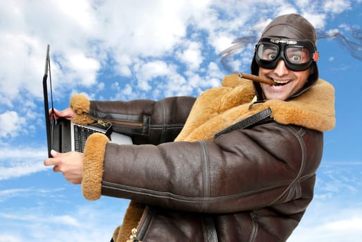 Fighter pilot with laptop at full speed
