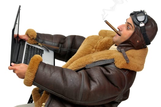 Figther pilot with laptop isolated in white