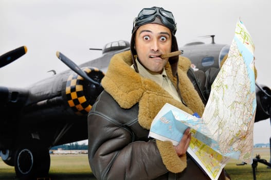 WWII figther pilot with map and funny face