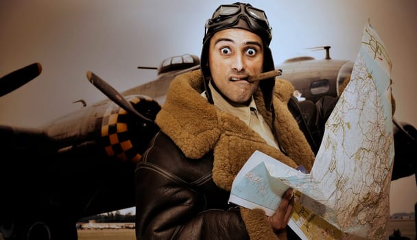 WWII figther pilot with map and funny face