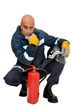 Fireman with extinguisher isolated in white