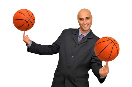 Businessman with several basketballs isolated in white