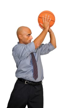 Businessman with basketball isolated in white