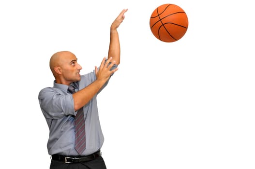 Businessman with basketball isolated in white