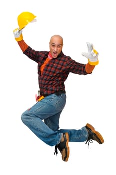 Happy construction worker jumping isolated in white