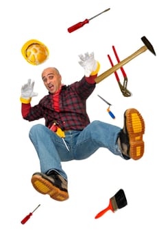 Construction worker falling with tools isolated in white