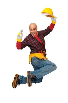 Happy construction worker jumping isolated in white