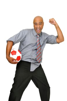 Happy businessman with soccer ball commemorating a victory isolated in white