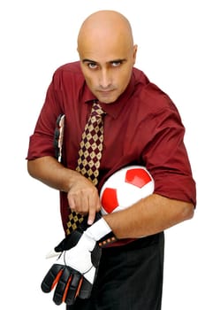 Businessman goalkeeper putting his gloves isolated in white