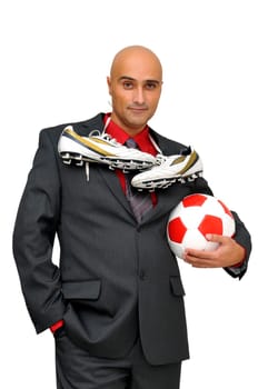 Businessman with soccer ball isolated in white