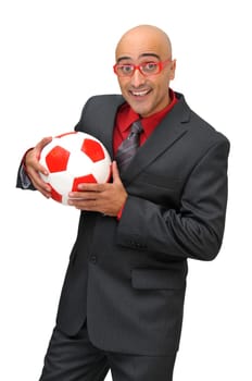 Businessman with a soccer ball isolated in white